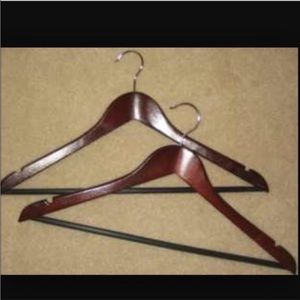30 cherry wood hangers w swivel top. Great condition